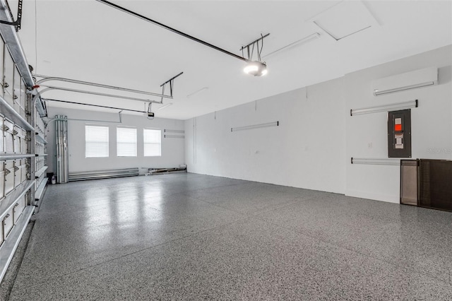 garage with a garage door opener, electric panel, and a wall mounted air conditioner