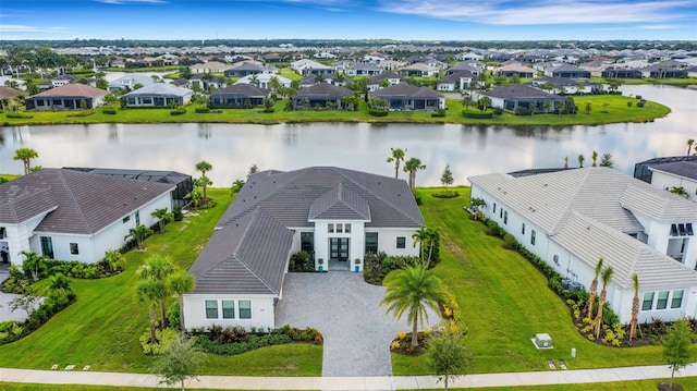 drone / aerial view featuring a water view