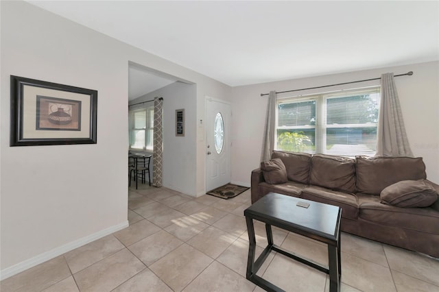 living room featuring light tile patterned floors