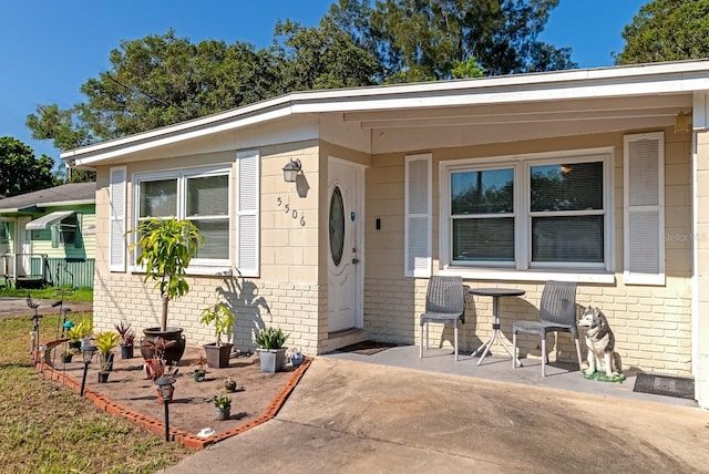 view of front facade with a patio area