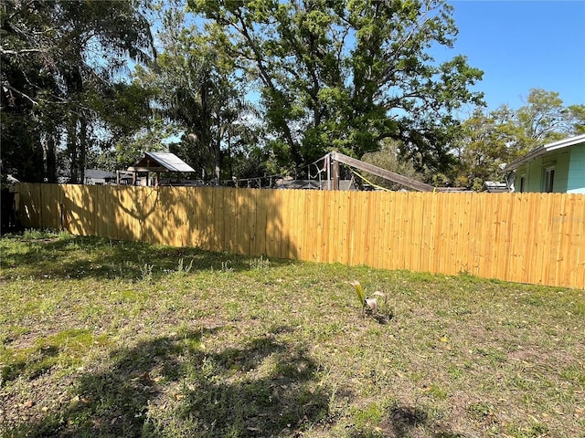 view of yard with fence