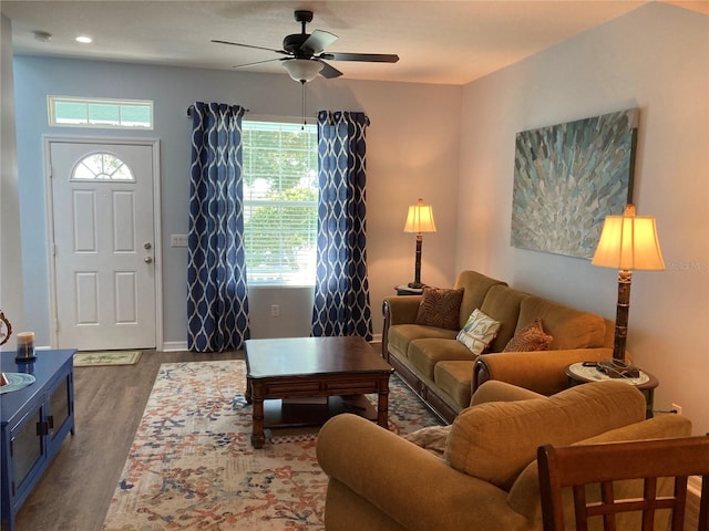 living room with ceiling fan, hardwood / wood-style flooring, and a wealth of natural light