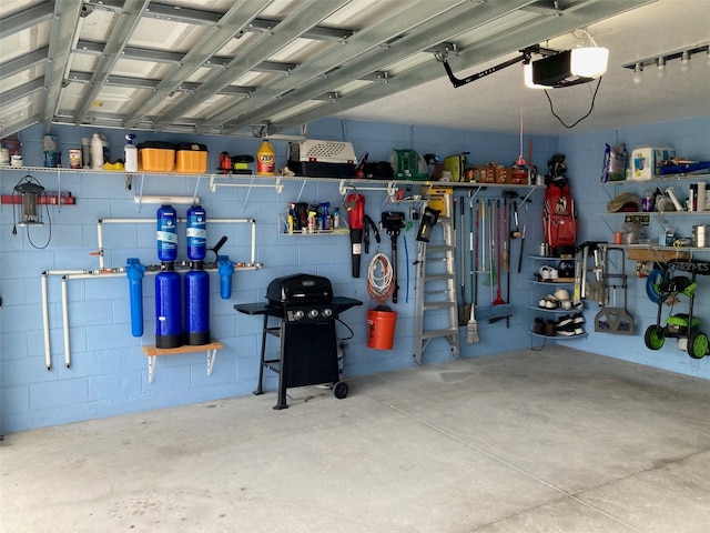 garage featuring a garage door opener