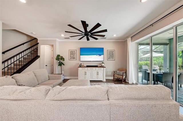 living room with ceiling fan, crown molding, and wood-type flooring