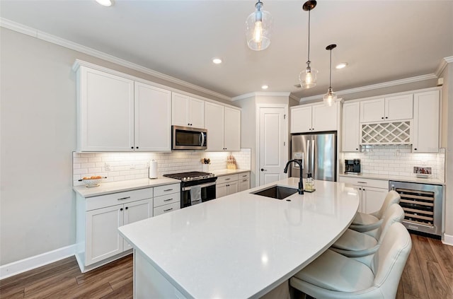 3360 Chestertown Loop, Bradenton, FL 34211 - kitchen with a sink, wine cooler, dark wood-style flooring, and appliances with stainless steel finishes