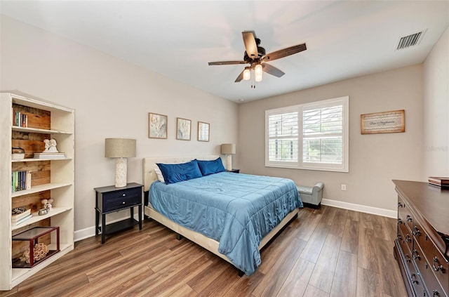 bedroom featuring ceiling fan and hardwood / wood-style floors