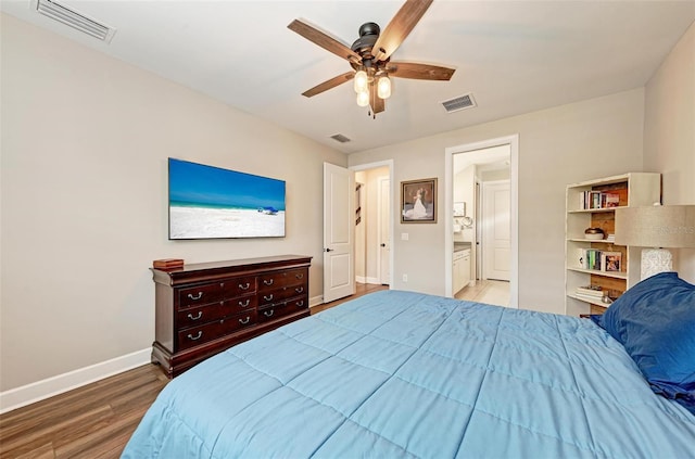 3360 Chestertown Loop, Bradenton, FL 34211 - bedroom featuring baseboards, visible vents, and wood finished floors