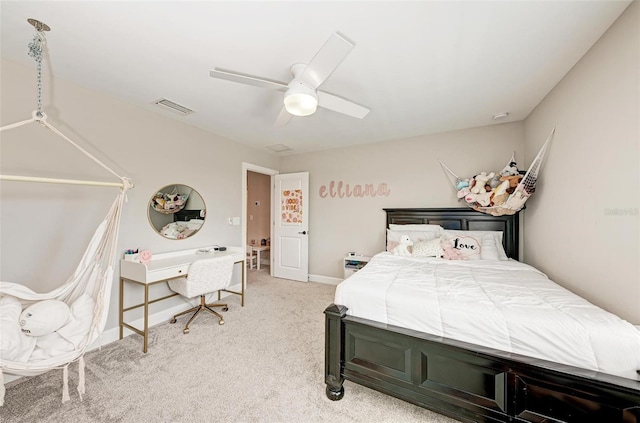 bedroom with ceiling fan and carpet floors