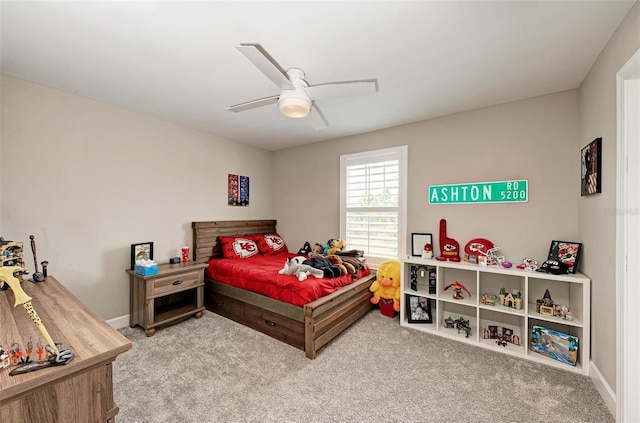 carpeted bedroom with ceiling fan