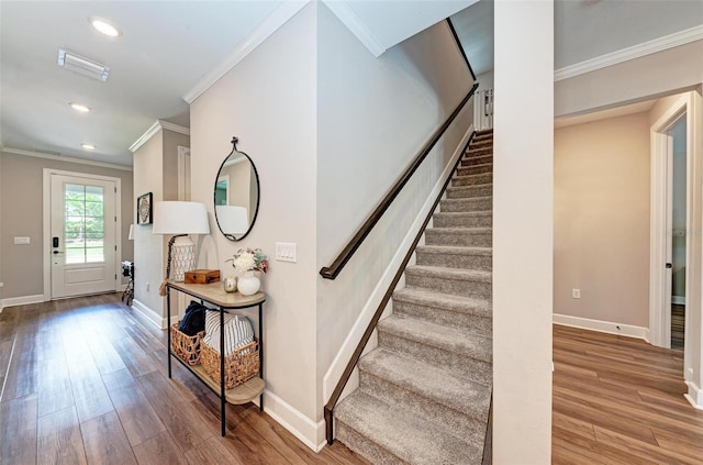 3360 Chestertown Loop, Bradenton, FL 34211 - staircase featuring wood finished floors, ornamental molding, visible vents, recessed lighting, and baseboards