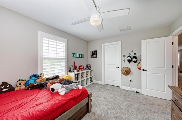 carpeted bedroom featuring ceiling fan