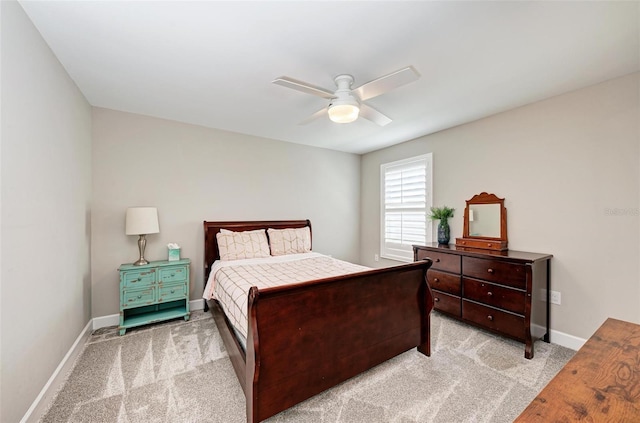 3360 Chestertown Loop, Bradenton, FL 34211 - bedroom featuring baseboards, ceiling fan, and light colored carpet
