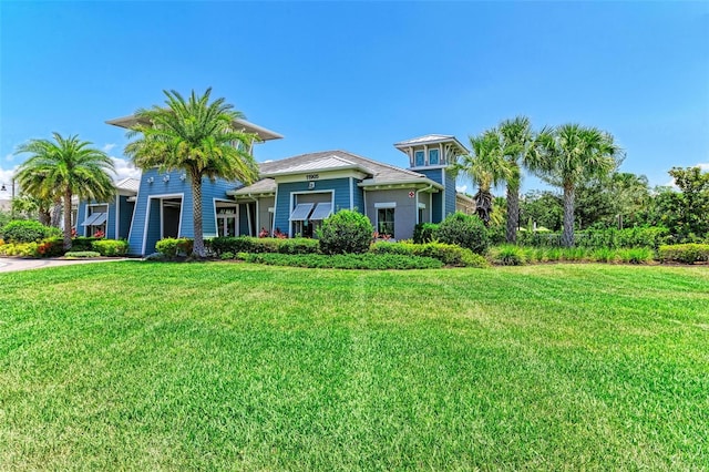 view of front of home with a front yard