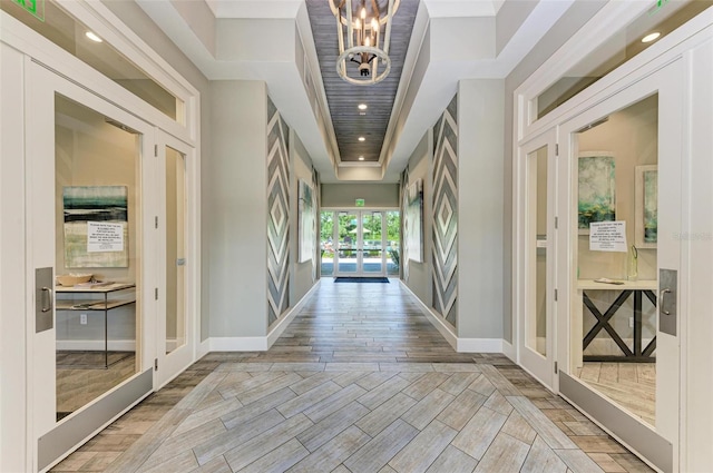 3360 Chestertown Loop, Bradenton, FL 34211 - hallway featuring a chandelier, baseboards, and recessed lighting
