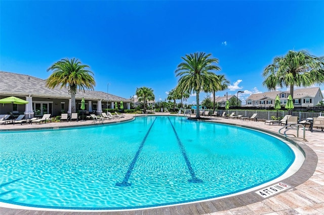 3360 Chestertown Loop, Bradenton, FL 34211 - community pool with a patio area and fence