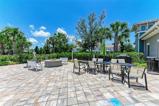 3360 Chestertown Loop, Bradenton, FL 34211 - view of patio with an outdoor fire pit and outdoor dining area