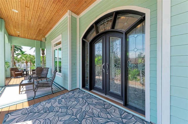 property entrance featuring a porch