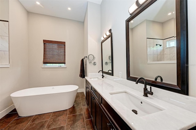 bathroom featuring vanity and separate shower and tub