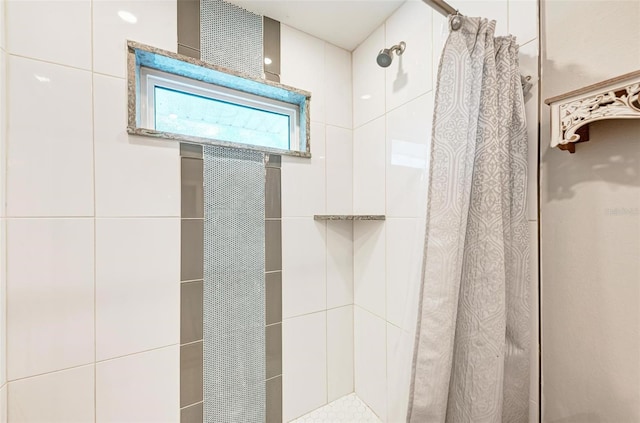 bathroom with a shower with shower curtain