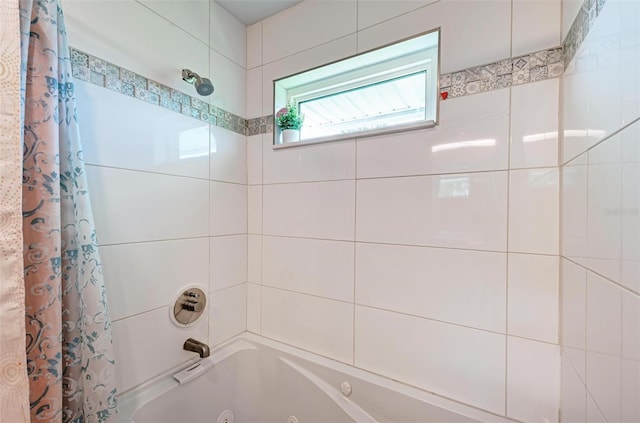 bathroom featuring shower / tub combo