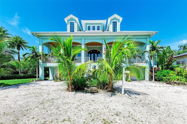 coastal home with covered porch