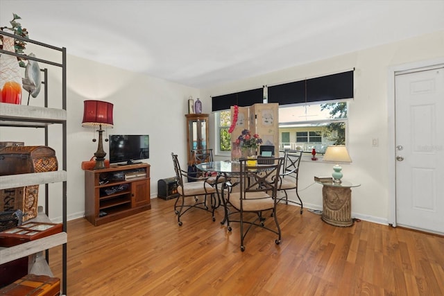 dining room featuring light hardwood / wood-style floors