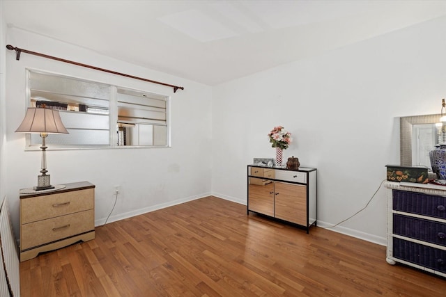 bedroom featuring hardwood / wood-style floors