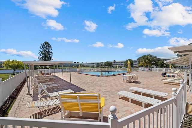 view of swimming pool featuring a patio