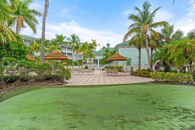 view of home's community with a patio area