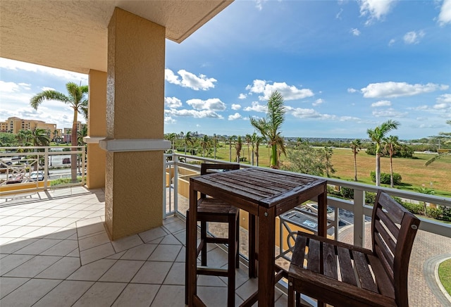 view of patio with a balcony