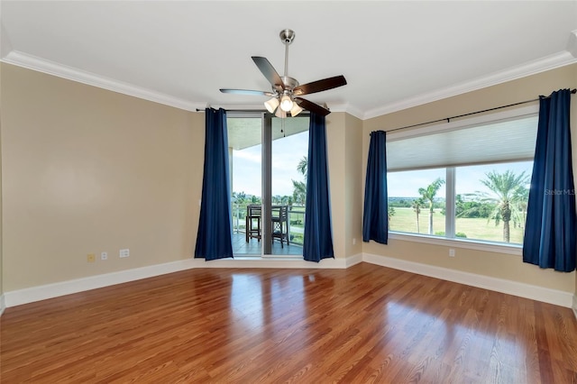 unfurnished room with ceiling fan, hardwood / wood-style floors, and ornamental molding