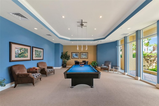 game room with pool table, light colored carpet, crown molding, and a tray ceiling