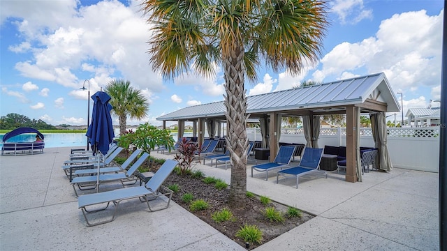 view of patio / terrace with a water view