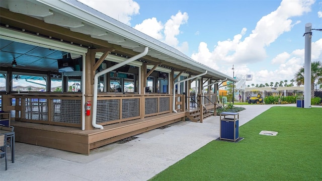 view of dock featuring a yard