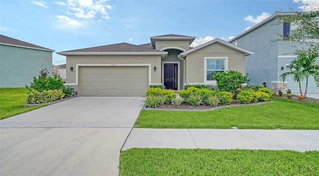 view of front of house with a garage and a front lawn