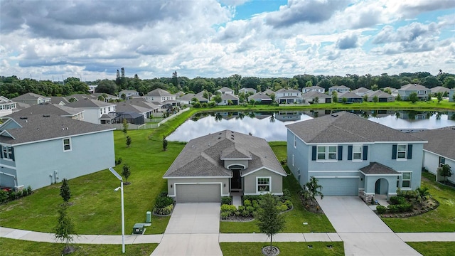 bird's eye view with a water view