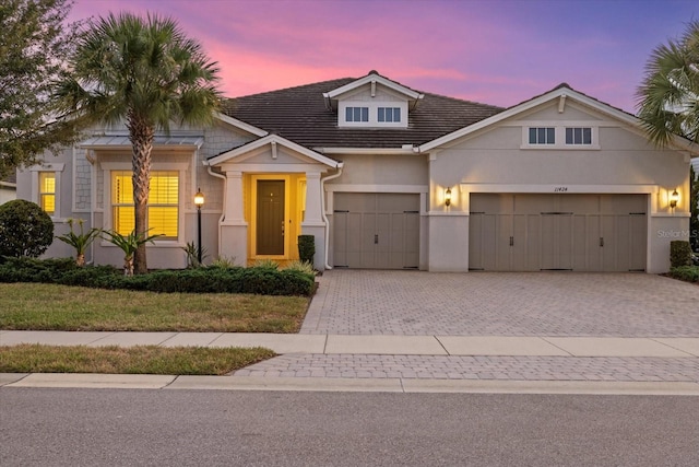 view of front of home with a garage