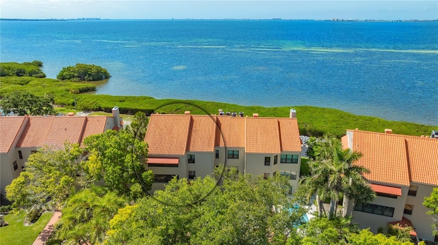 birds eye view of property featuring a water view