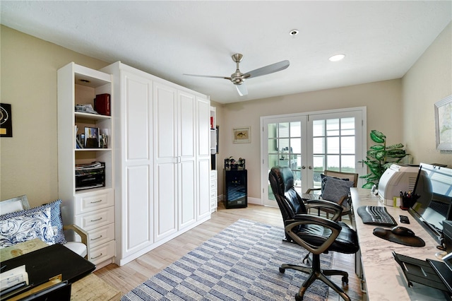 home office with french doors, light hardwood / wood-style flooring, and ceiling fan