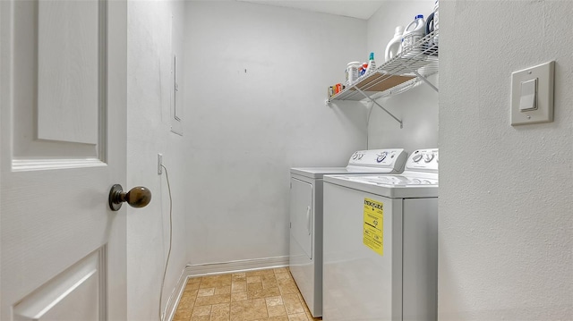 washroom featuring washing machine and clothes dryer