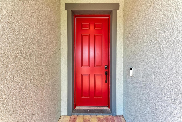 property entrance featuring elevator