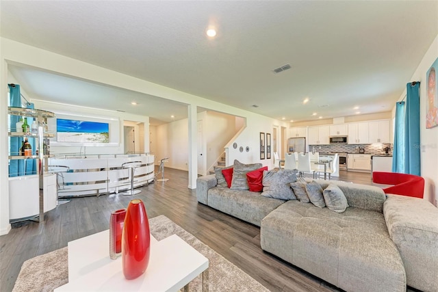 living room with hardwood / wood-style floors