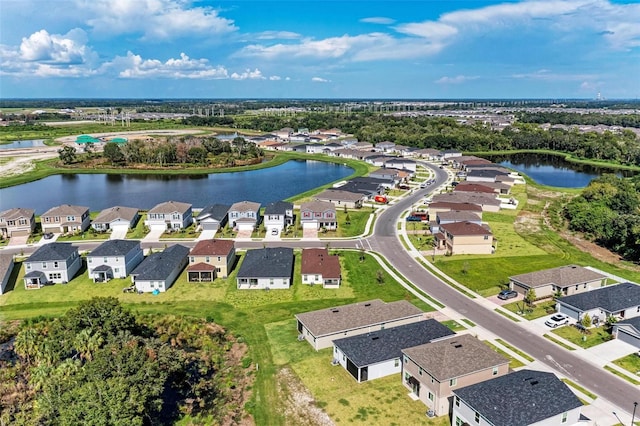 drone / aerial view with a water view