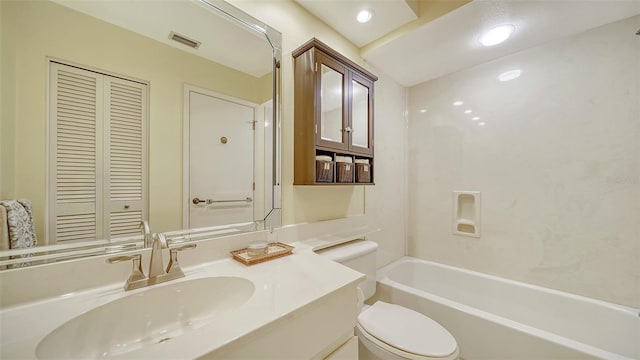 full bathroom featuring shower / tub combination, vanity, and toilet