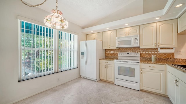 kitchen featuring hanging light fixtures, vaulted ceiling, light tile patterned flooring, backsplash, and white appliances