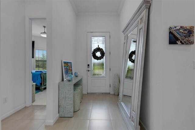 tiled entryway with ornamental molding