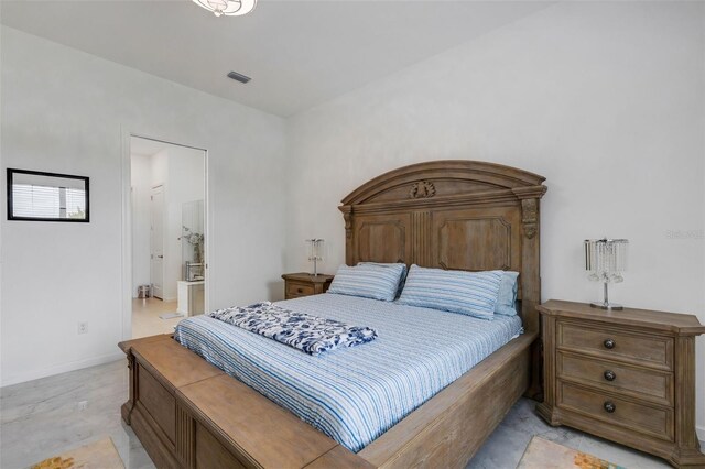 bedroom featuring ensuite bath