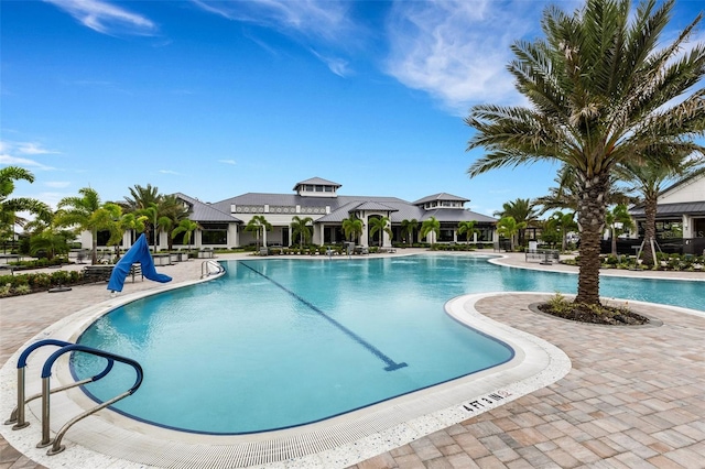 view of pool featuring a patio