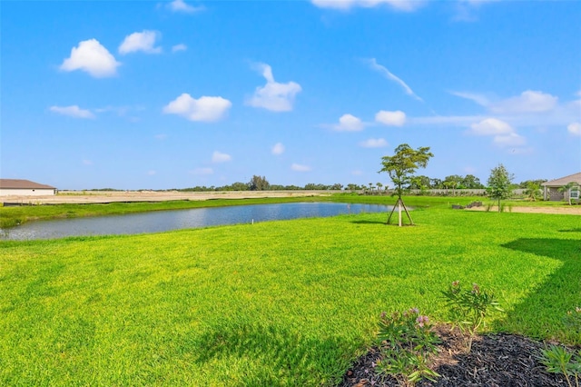 view of yard with a water view