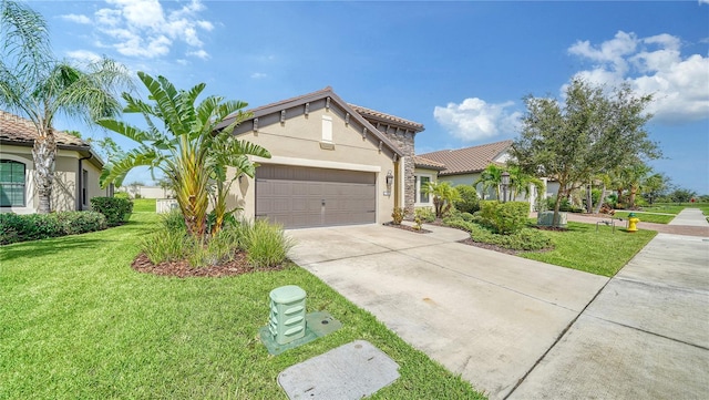 mediterranean / spanish-style house featuring concrete driveway, a tile roof, a front yard, an attached garage, and stucco siding